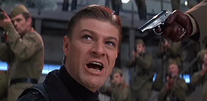 Sean Bean at gunpoint, surrounded by soldiers, meeting his inevitable fate in GoldenEye