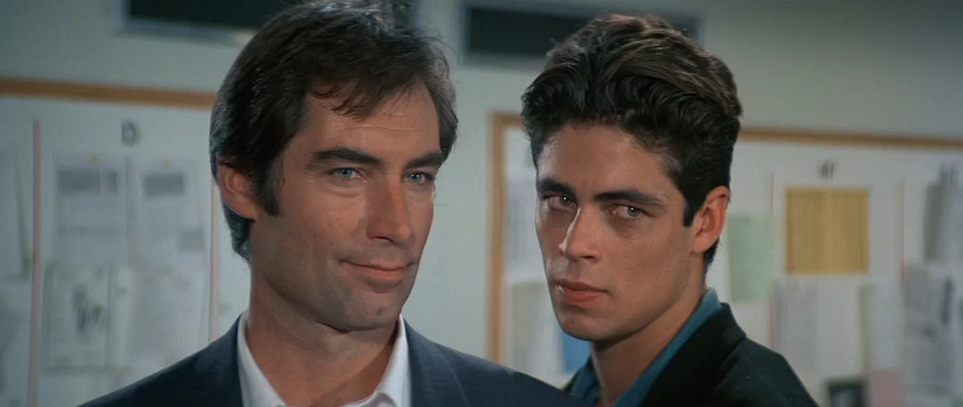 Timothy Dalton and a very young Benicio del Toro in an intense close-up in Licence to Kill