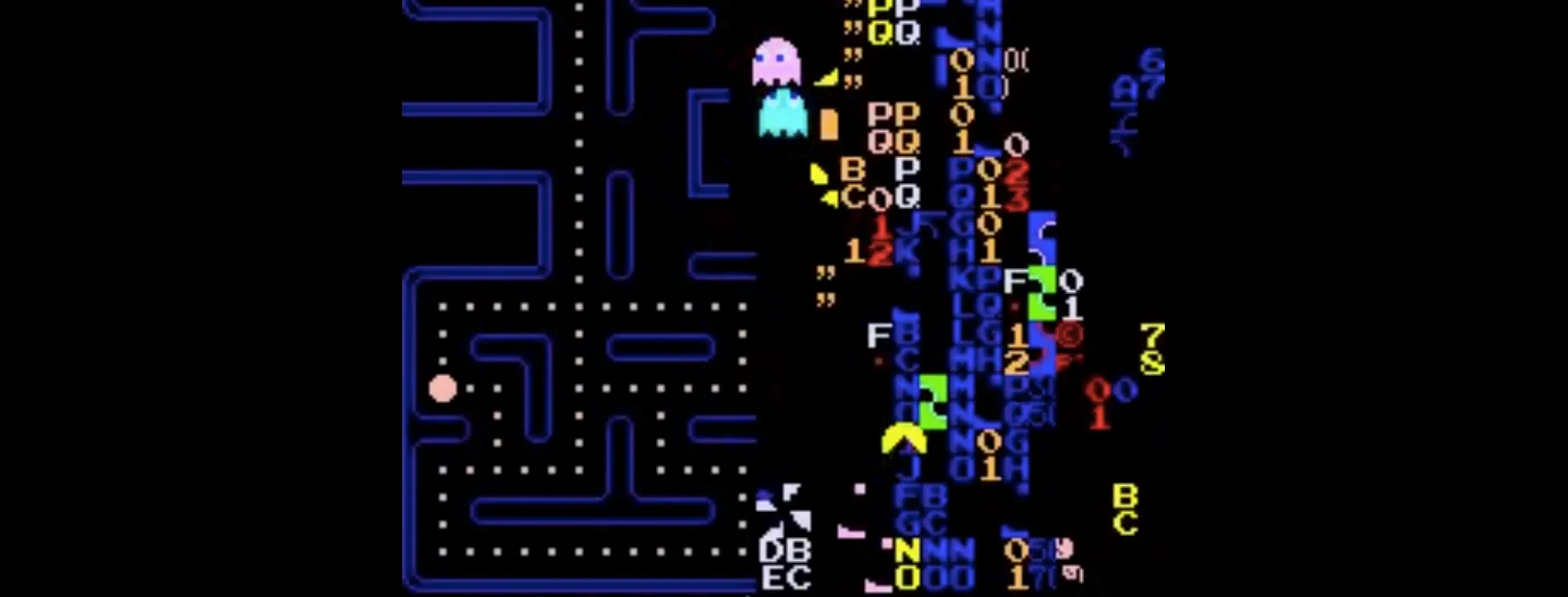 Pac-Man game screen glitching apart, the right half dissolving into scrambled coloured characters and symbols